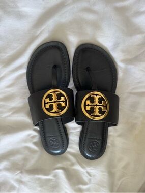 Tory Burch Black Leather Sandals with Gold Logo Discs